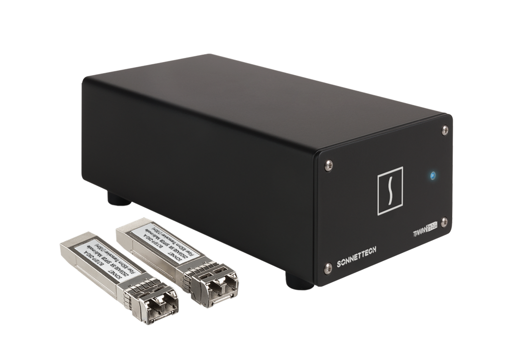 Twin10G SFP28 Thunderbolt Adapter with SFP28 transceivers next to enclosure.
